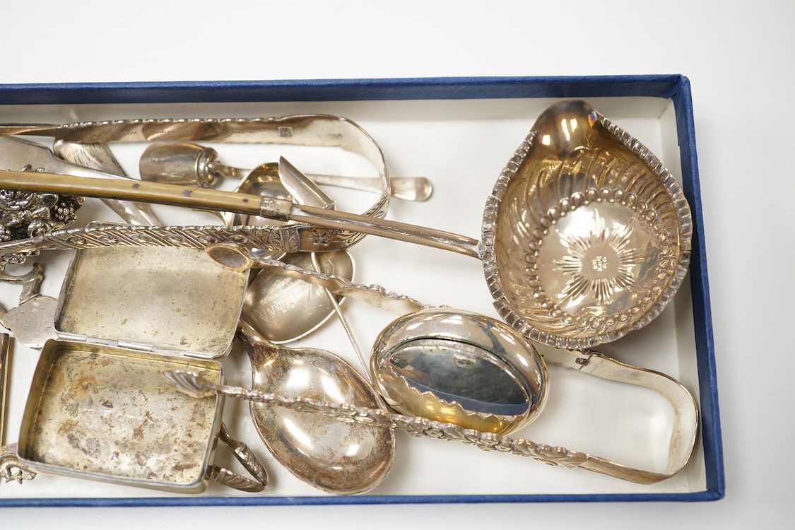 Sundry small silver including two pill boxes, a concave card case, Saunders & Shepherd, Chester, 1897, 79mm, unmarked toddy ladle with baleen handle, 925 flower ornament, small cream jug, two pairs of Georgian sugar tong
